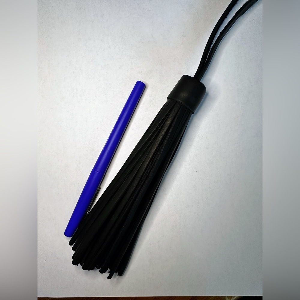 Black leather tassel purse charm